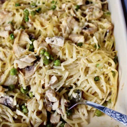 Turkey Tetrazzini, in casserole with serving fork in corner