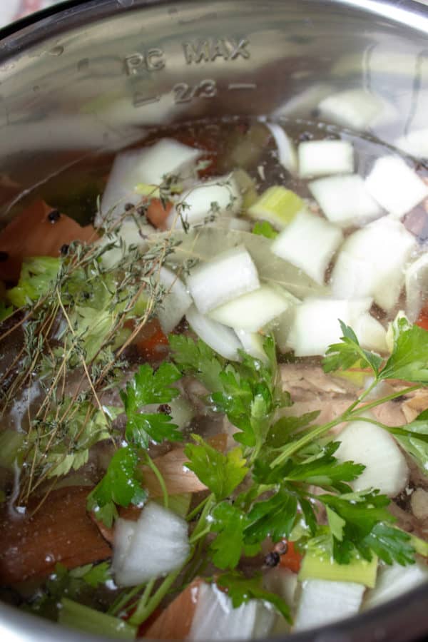 Easy Instant Pot Chicken Stock the hungry bluebird
