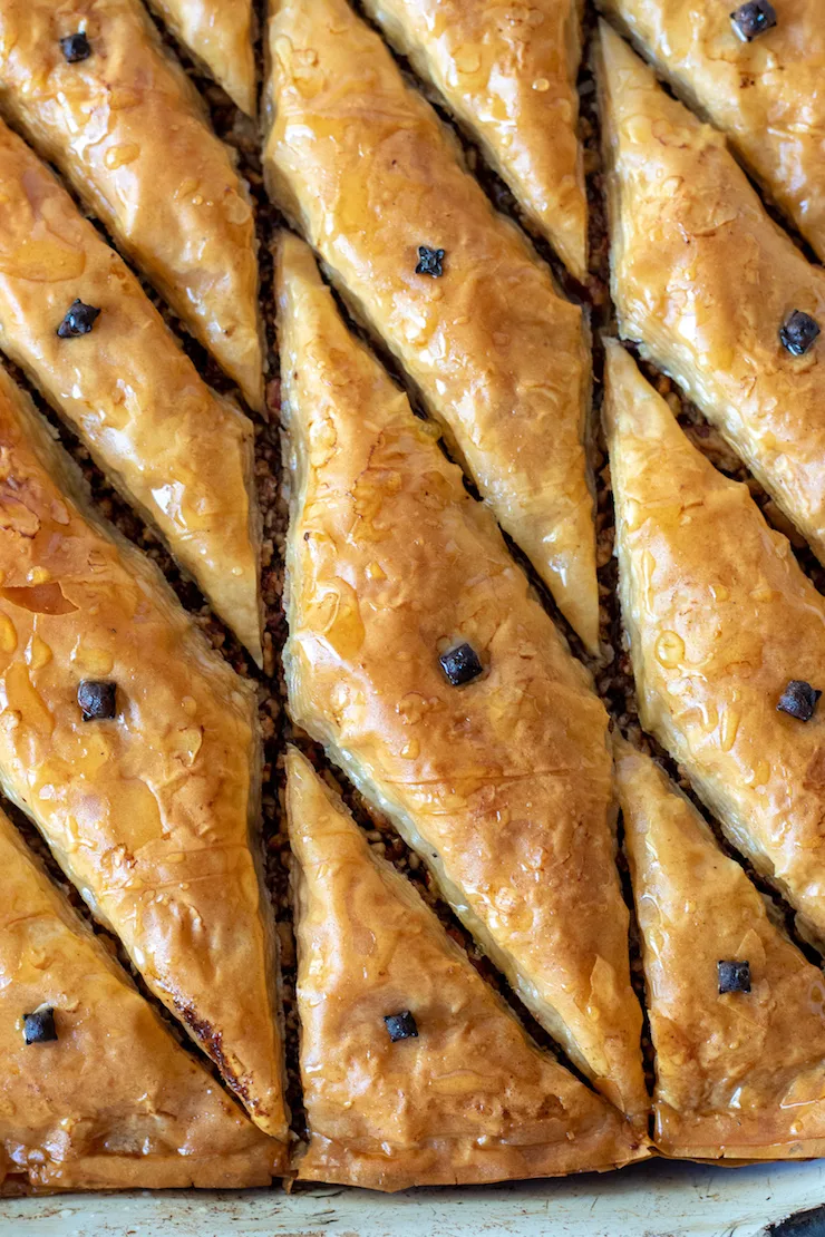 Closeup of baked baklava in pan.