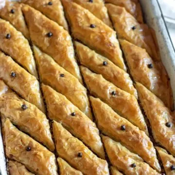 Greek baklava cut in diamonds, baked in pan