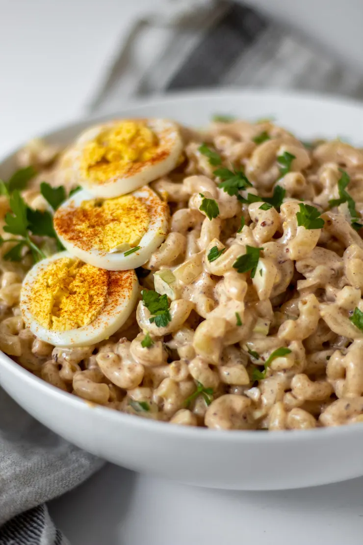 Cajun macaroni salad in serving bowl.