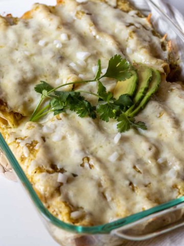 Pan of baked enchiladas suizas.