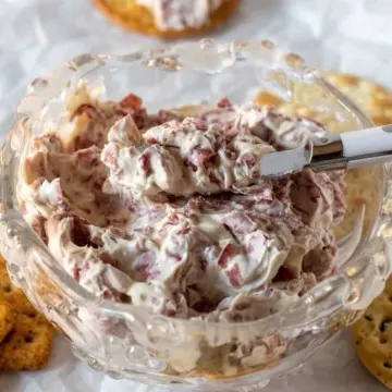 Close up of chipped beef dip in serving bowl.