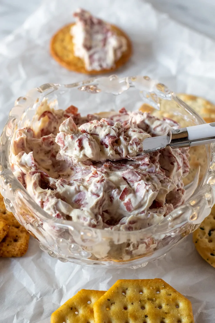 Close up of chipped beef dip in serving bowl.