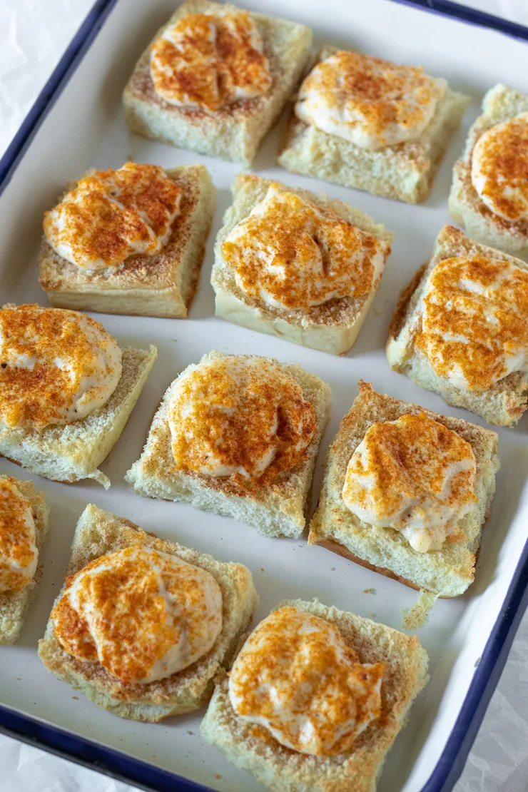 Tray of hot crab appetizers.