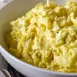 Close up of potato salad in bowl.