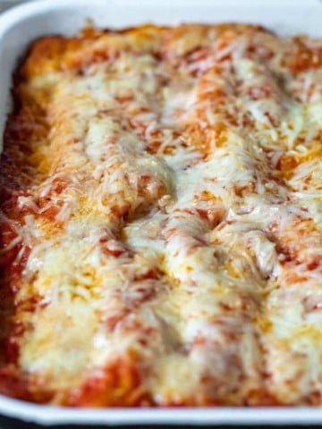 Pan of baked beef and cheese manicotti.