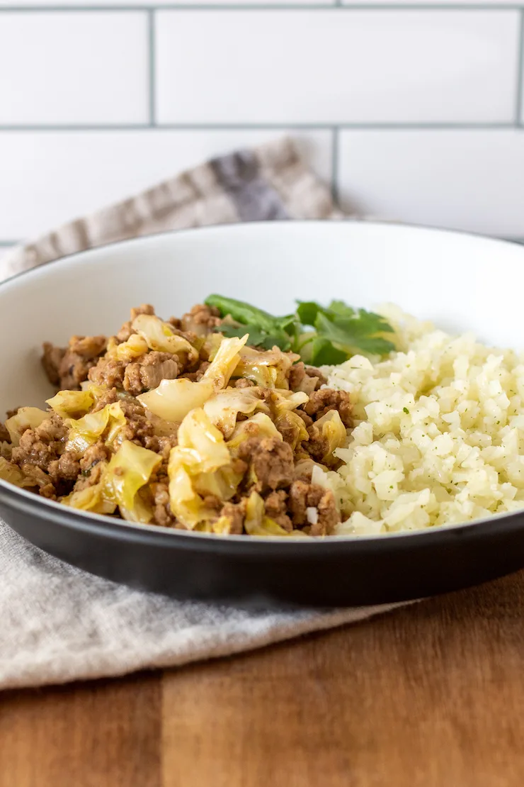 Stir-fry on plate with cauliflower rice.