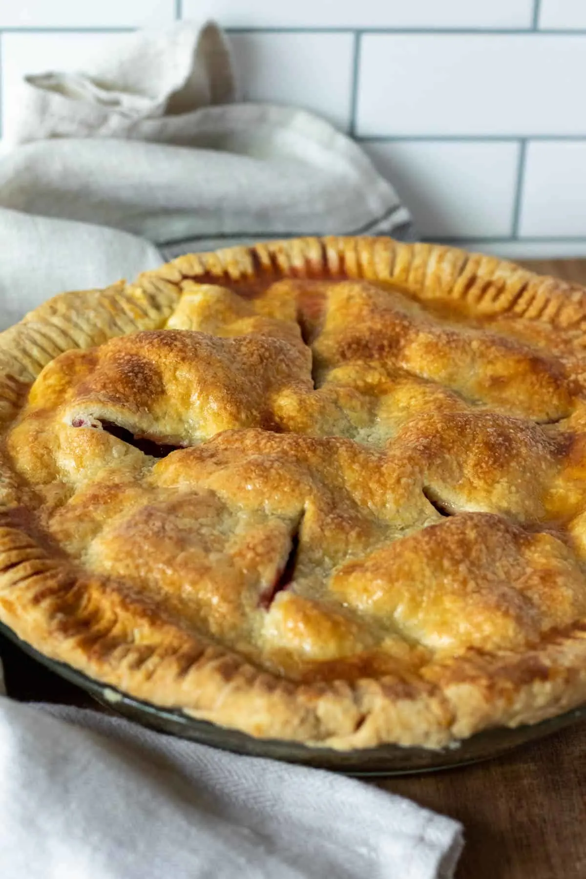 Finished pie out of oven, cooling on counter.