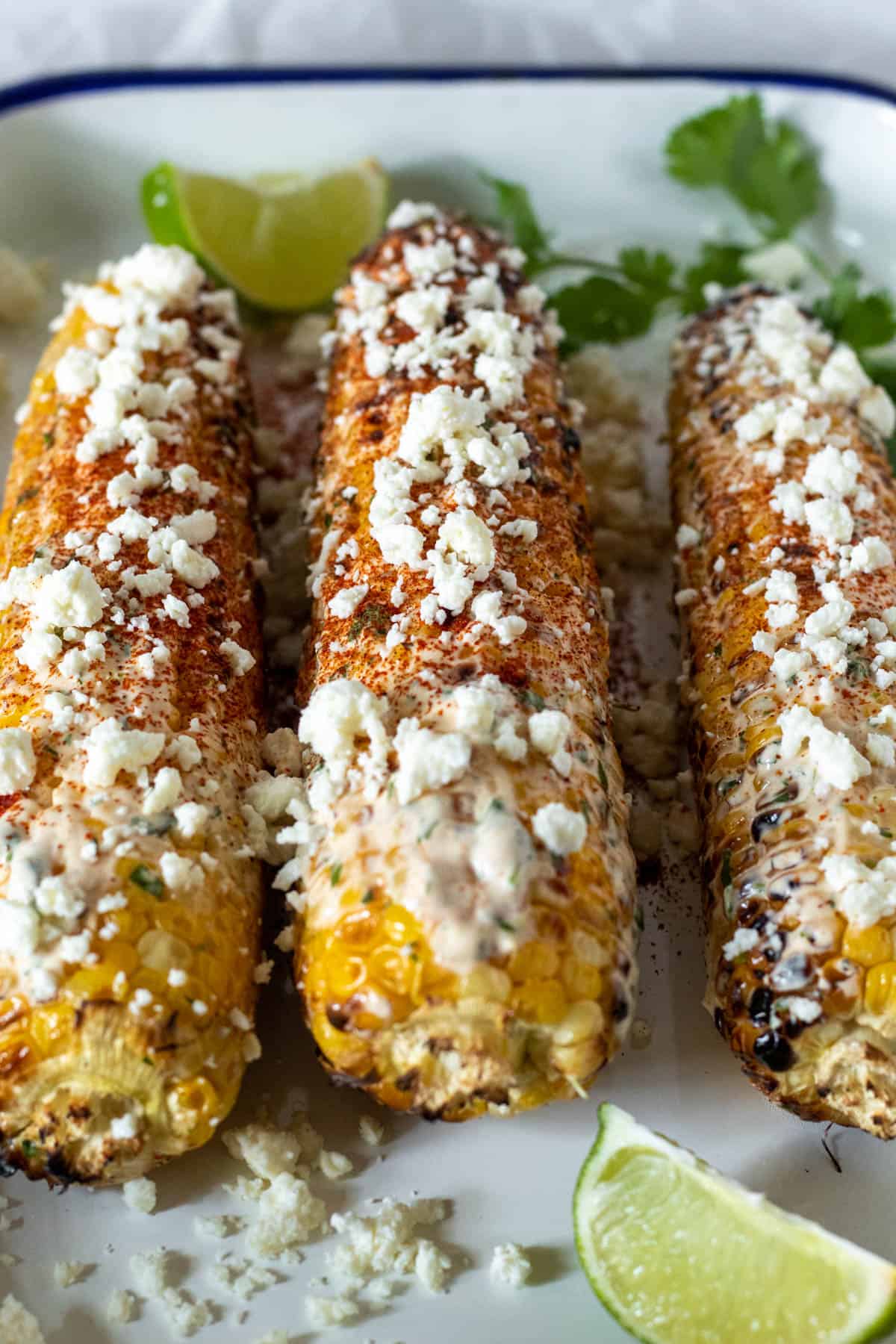 Mexican street corn on serving platter.