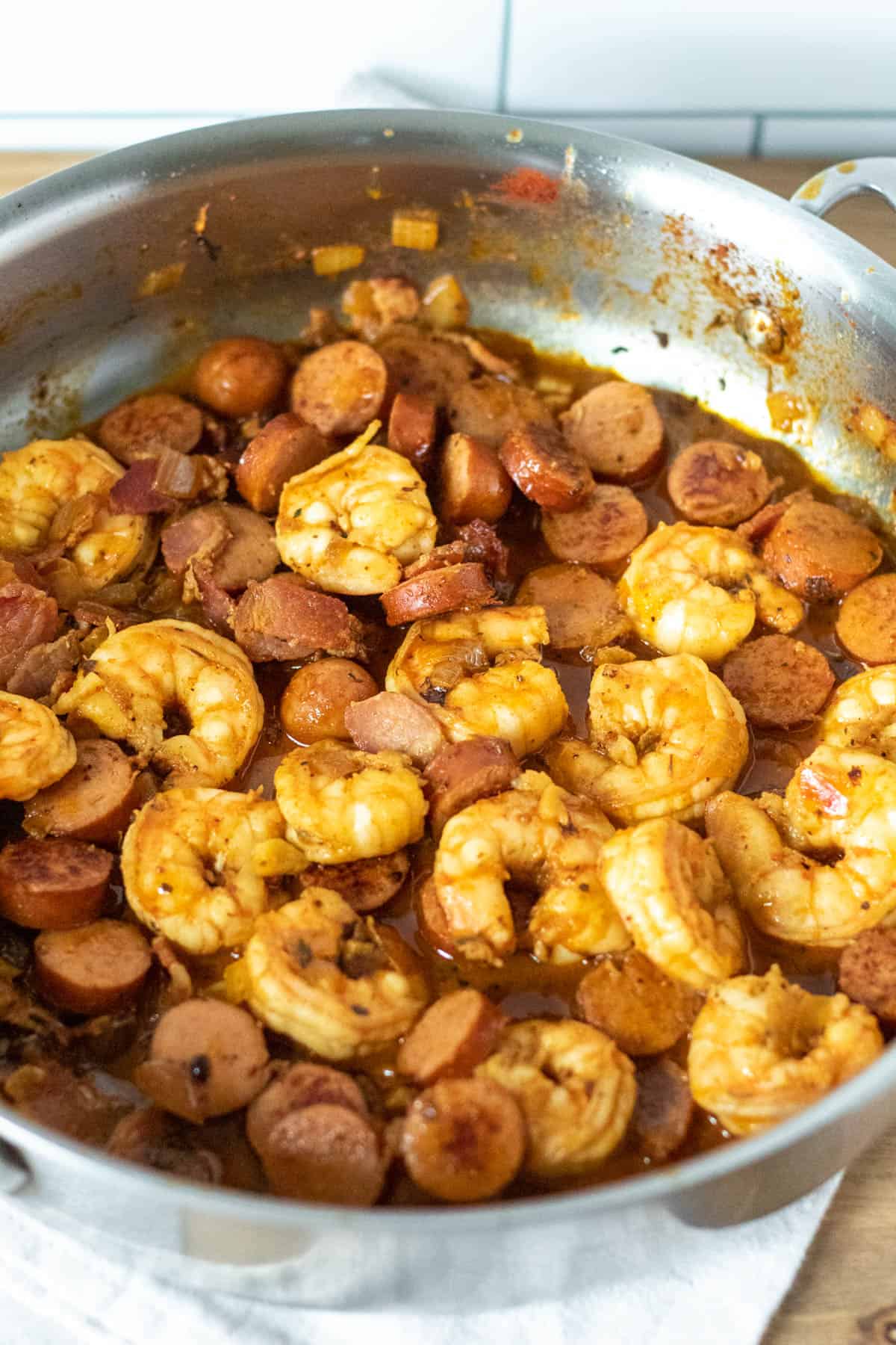 Finished shrimp and sausage mixture in pan.