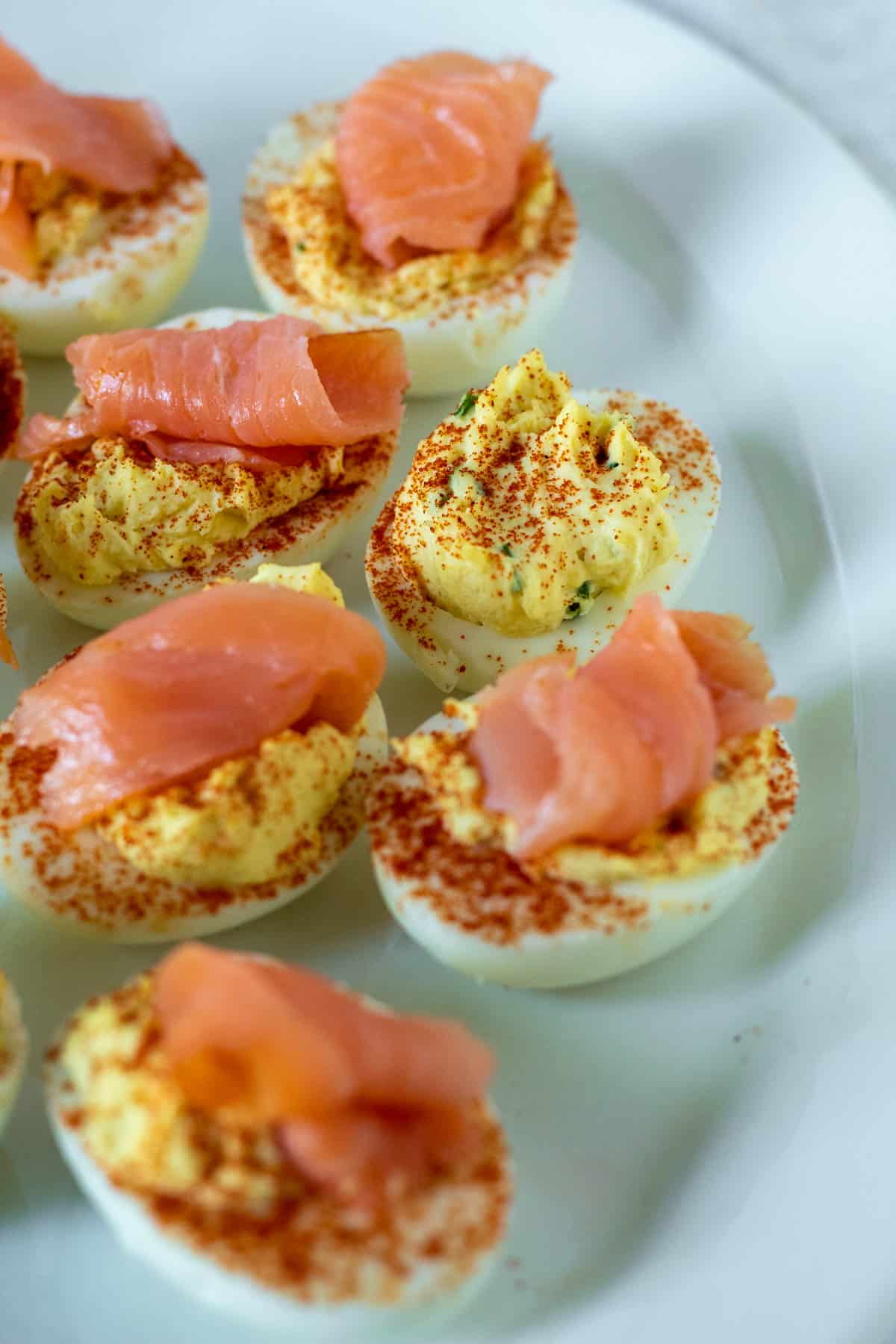 Platter of deviled eggs, both plain and with smoked salmon.